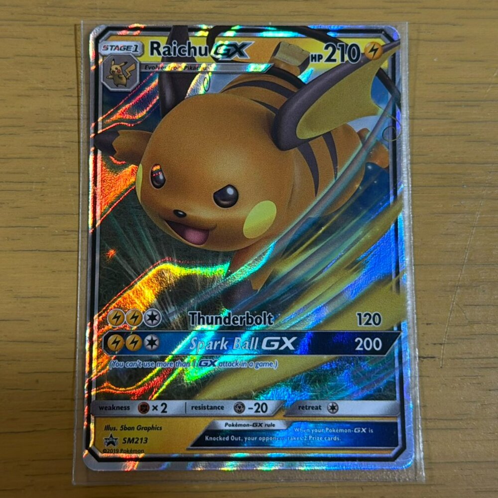 Pokémon Raichu GX SM213 Sun Moon Black Star Promo